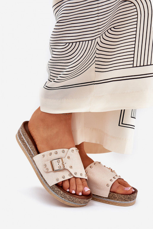 Women's slippers with platform, buckles and spikes in sand Nusithia