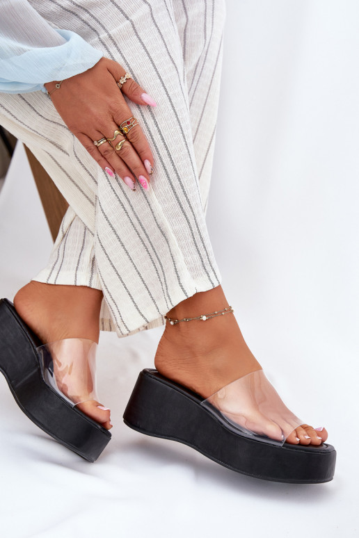 Black women's slippers with transparent straps on the platform Meltiana