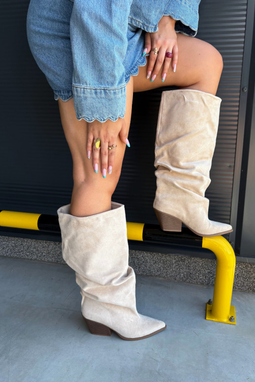 Women's over-the-knee boots with a curved upper part and heels made of suede in sand color Durela
