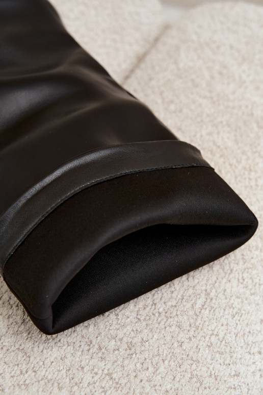 Black slip-on knee-high boots with heels and pointed toes made of faux leather Blenia