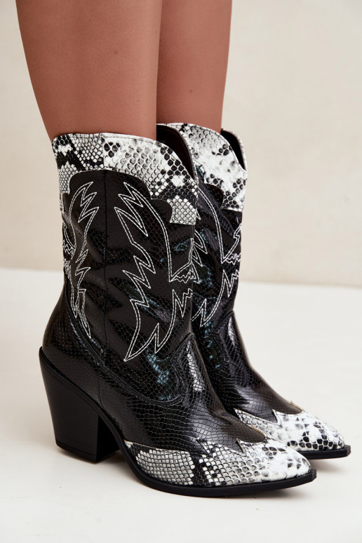 faux fur cowboy-style ankle boots with embossed detail in black and white Ambery