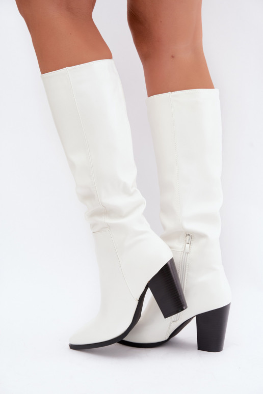 faux fur long boots on the shaft made of faux leather in white color Drelia