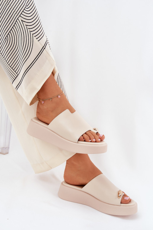 women's slippers with platform and decorative details in sand