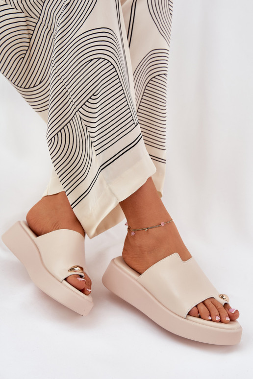 women's slippers with platform and decorative details in sand