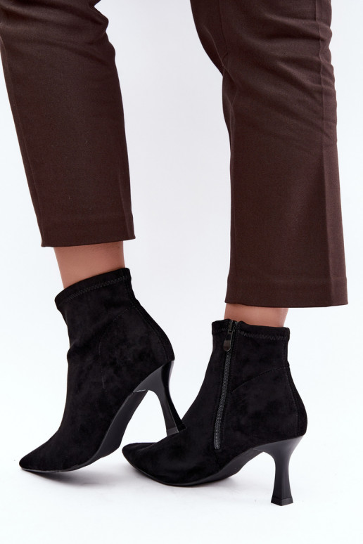Women's ankle boots on a slim heel with stitching in black color Clancy