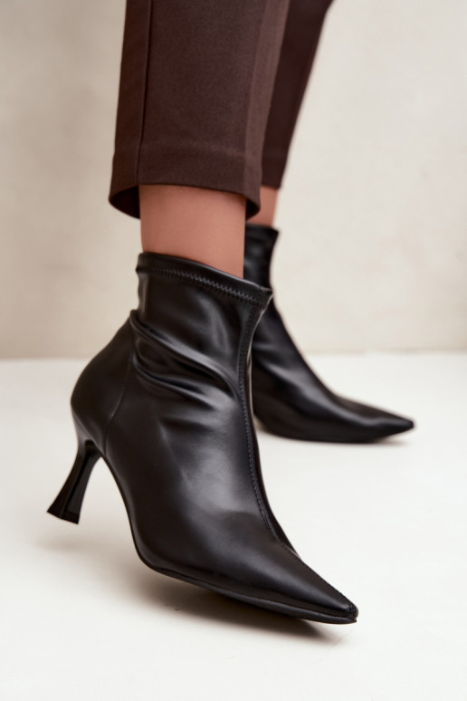 Women's ankle boots on a slim heel with stitching made of faux leather in black color Clancy