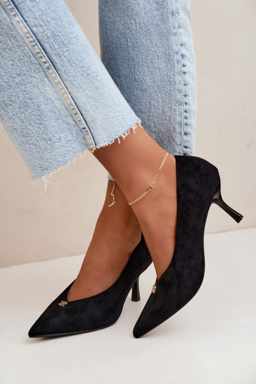 Sandals made of faux suede with gold details in black color Adessa