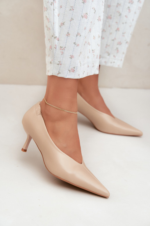 Heels with embroidery and decorative elements in sand color Dalis