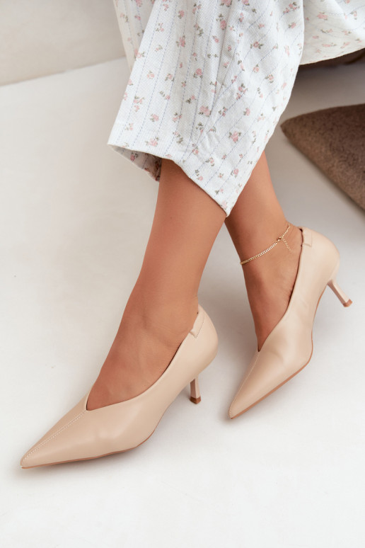 Heels with embroidery and decorative elements in sand color Dalis