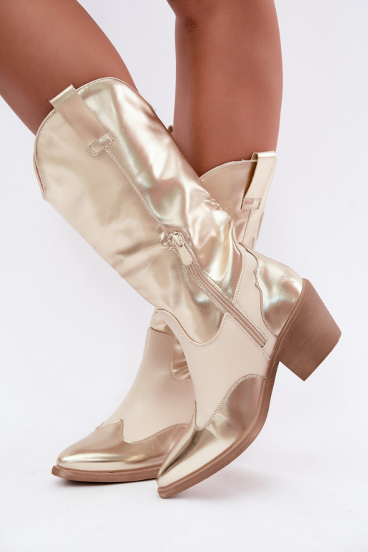 knee-high cowboy-style boots with heels in golden color