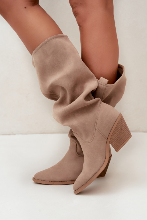 wrinkled women's knee-high boots in cowboy style with straps and heels in sand Adria