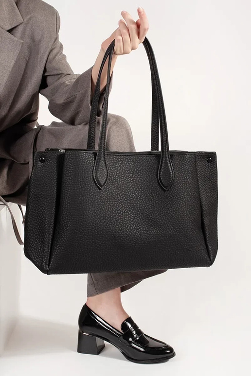 Black faux leather handbag