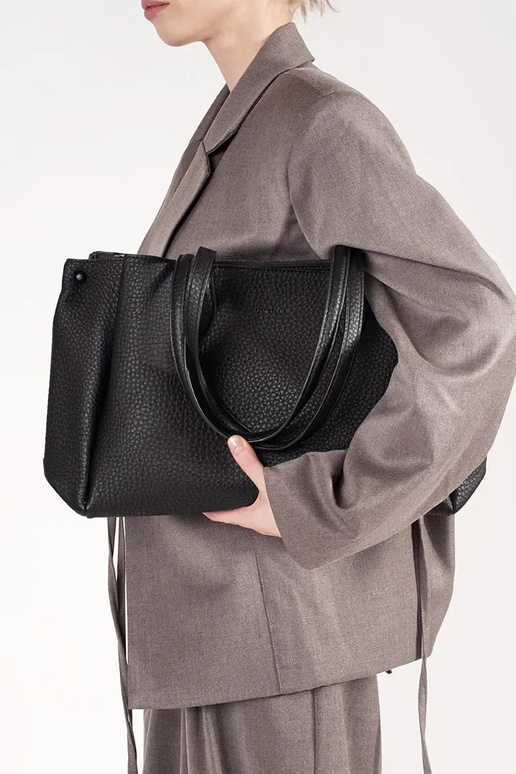 Black faux leather handbag