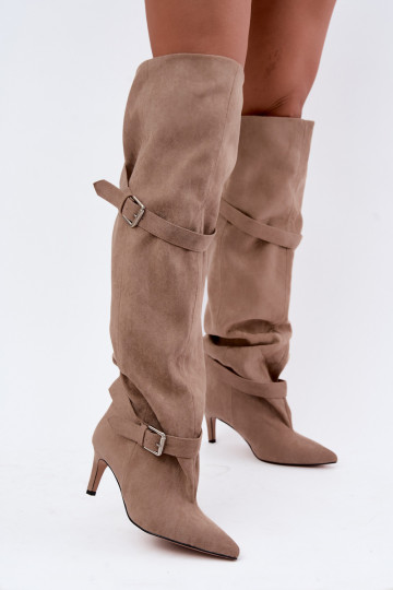 Ilgaauliai batai virš kelių su kulniukais įsispiriami su juostelėmis ir sagtimis smėlio spalvos Tai turibel