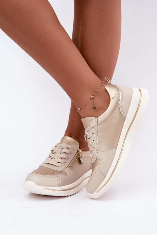 Oselia leather sneakers with decorative zipper in gold-beige
