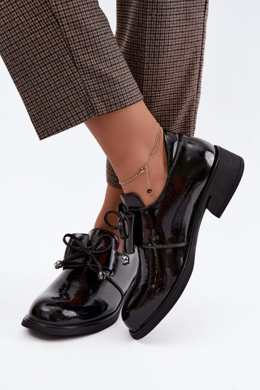 Patented faux leather shoes with bows T.Sokolski AN J26-190 in black color