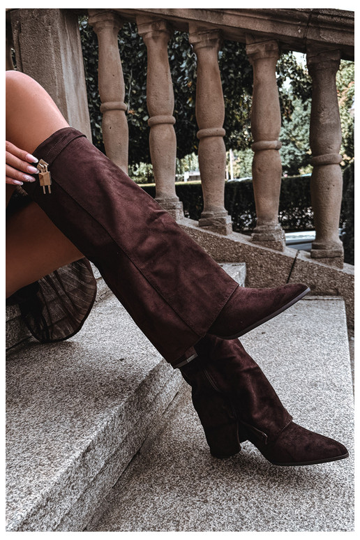 Warm long boots with heels featuring an embedded golden decoration in brown color Danessa