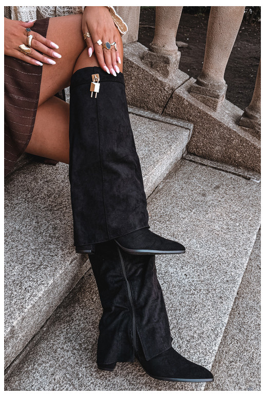 Warm long boots with heels featuring an embedded golden decoration in black color Danessa