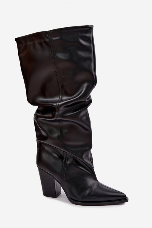 Slip-on knee-high boots with heels and ruffles in faux leather in black Jensy