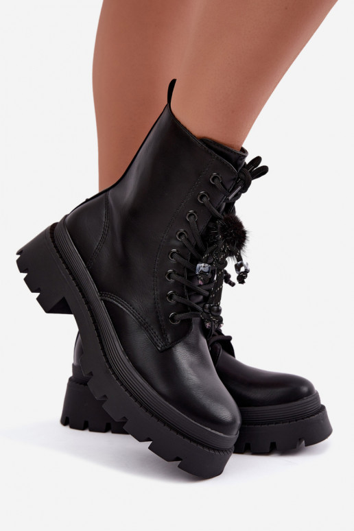 insulated ankle boots with fluffy pom-poms in black Faresse