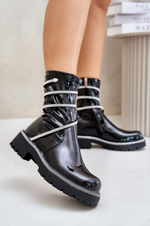 Patent ankle boots with decoration in black Kikizelle