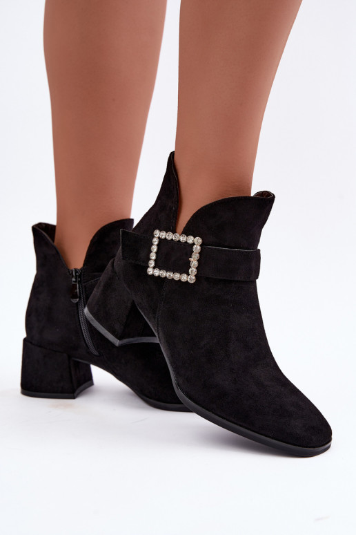 Ankle boots with straps and decorative buckle in black Ameline
