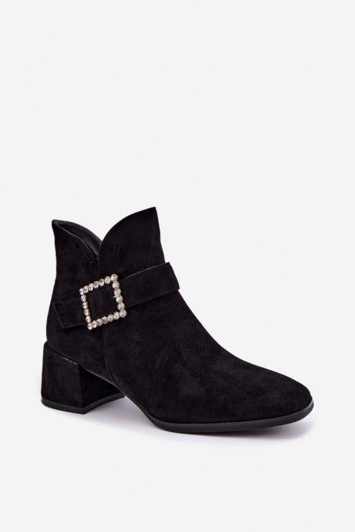 Ankle boots with straps and decorative buckle in black Ameline