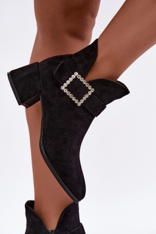 Ankle boots with straps and decorative buckle in black Ameline
