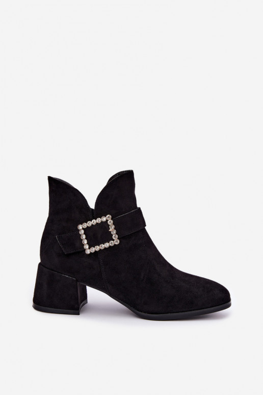 Ankle boots with straps and decorative buckle in black Ameline