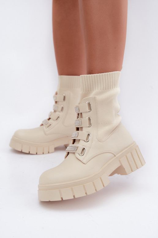 Warm ankle boots with decorative elements in sand color Giavelle