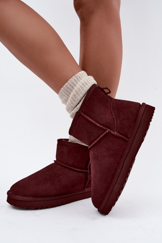 Warm snow boots made of faux suede with fur inside in black color Amandine