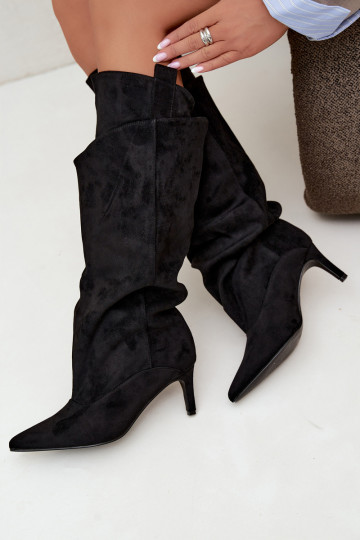 faux fur knee-high boots with ruffles and thin heels in black color Auretta