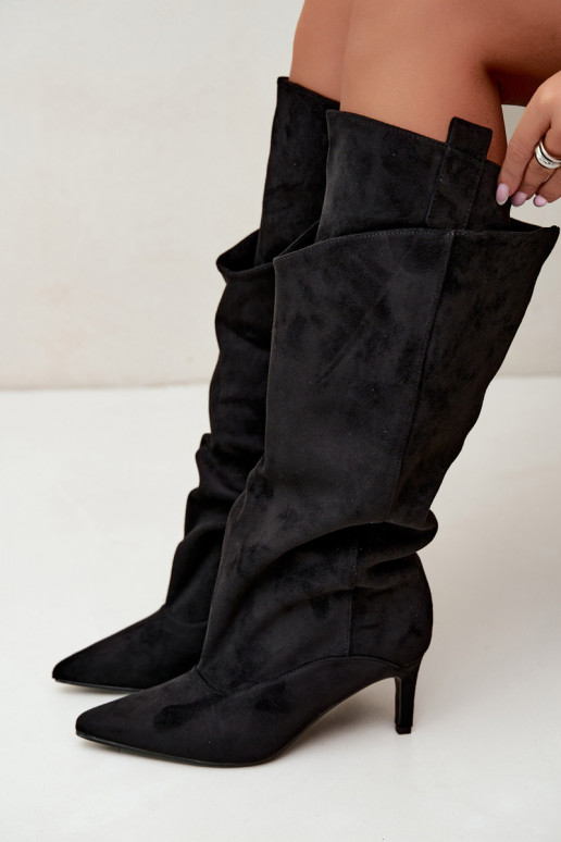 faux fur knee-high boots with ruffles and thin heels in black color Auretta