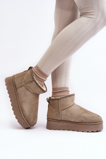 Green women's snow boots on a platform with insulation and fur inside Xamella