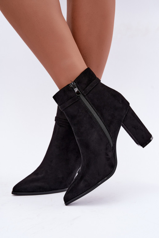 ankle boots with heels and decorative straps in black color Preselle