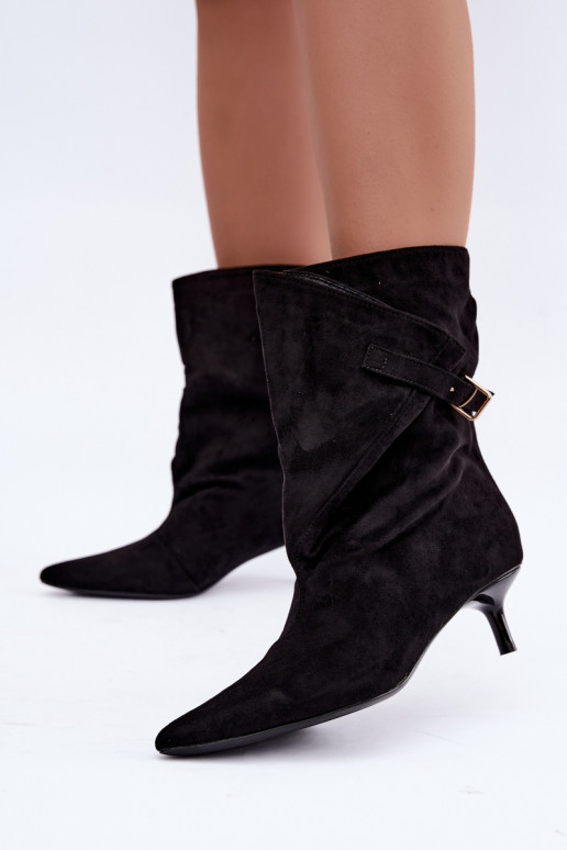 Low-heeled ankle boots with buckles in black color Canelisse