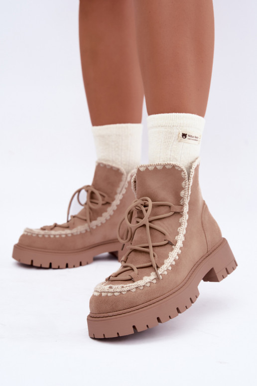 Snow boots with stylish details in sand color Cariselle