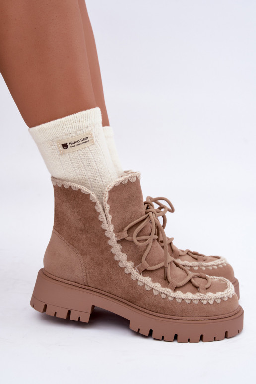 Snow boots with stylish details in sand color Cariselle