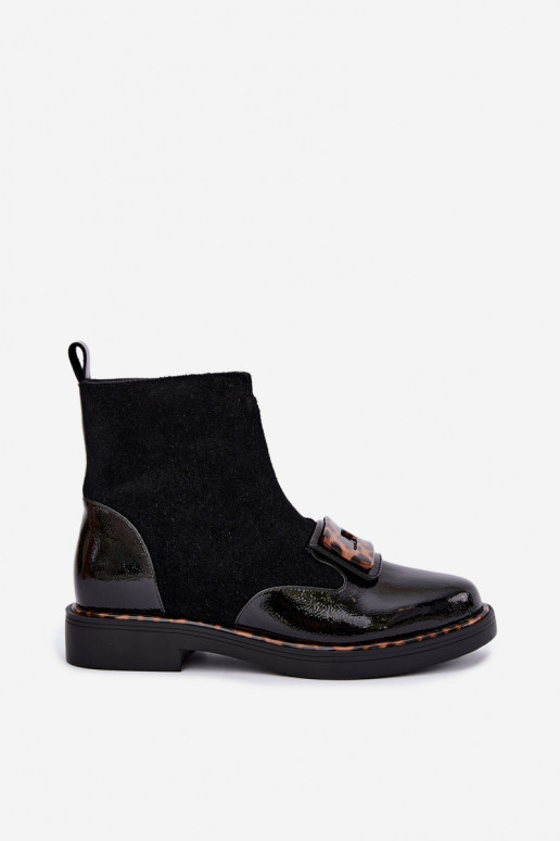 Black suede boots with decorative buckle