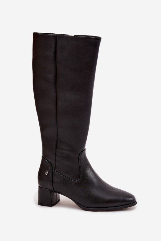 Black insulated women's over-the-knee boots made of leather with heels
