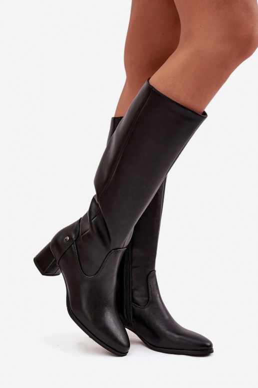 Black insulated women's over-the-knee boots made of leather with heels