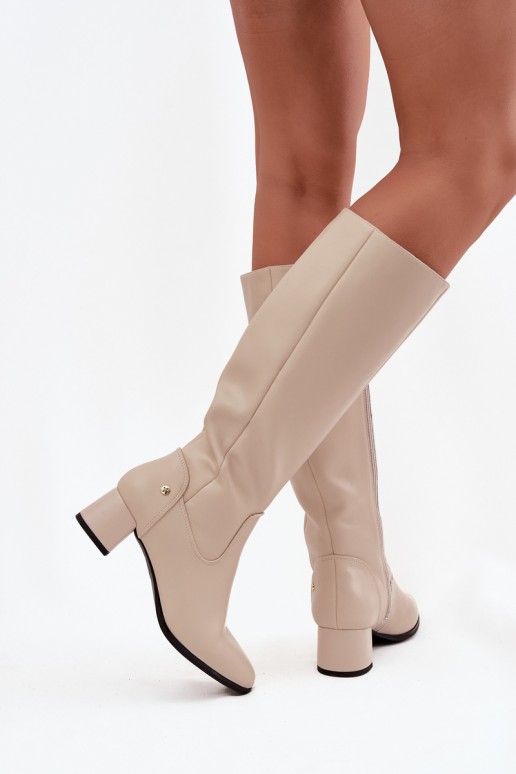 Sand-colored insulated women's over-the-knee boots made of leather with heels