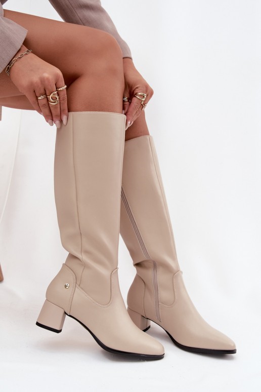 Sand-colored insulated women's over-the-knee boots made of leather with heels