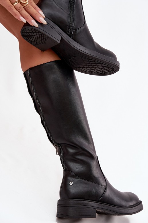 Black warm over-the-knee boots made of leather
