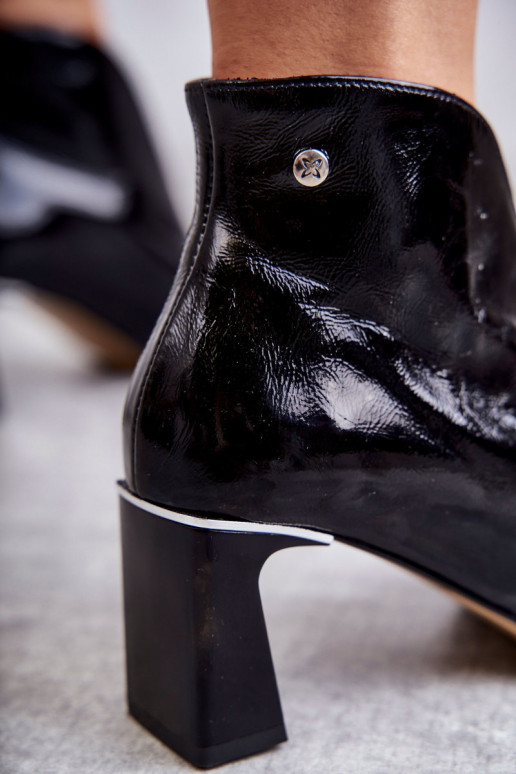 Leather boots on a post  Black Leather boots on a post  Black