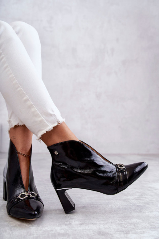 Leather boots on a post  Black Leather boots on a post  Black