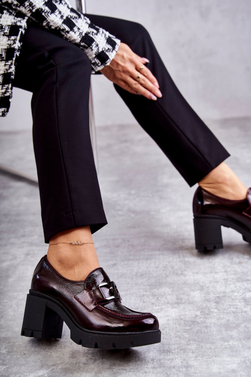 Elegant shoes on a pillar With Silver Ornament Red Harmell