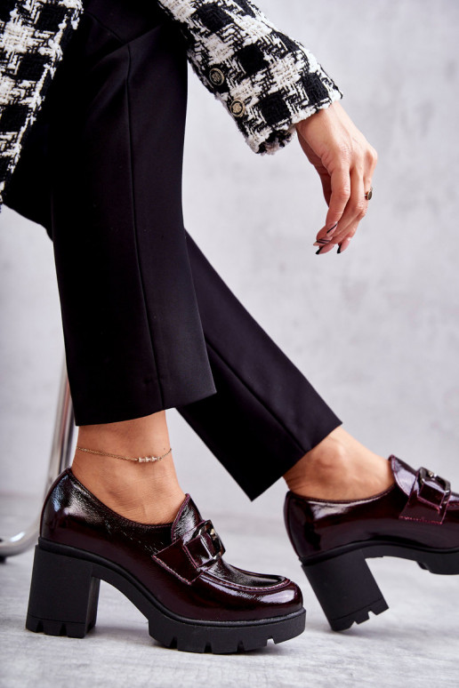 Elegant shoes on a pillar With Silver Ornament Red Harmell