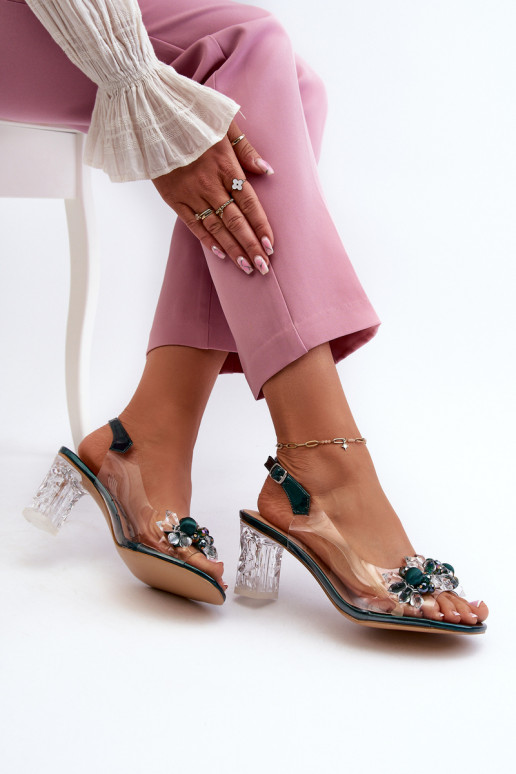 Transparent sandals on a heel with... Transparent sandals on a heel with...