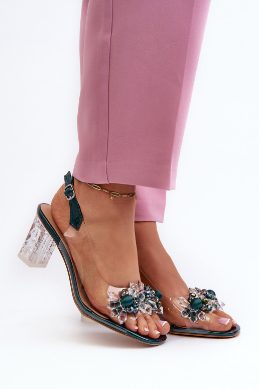 Transparent sandals on a heel with... Transparent sandals on a heel with...